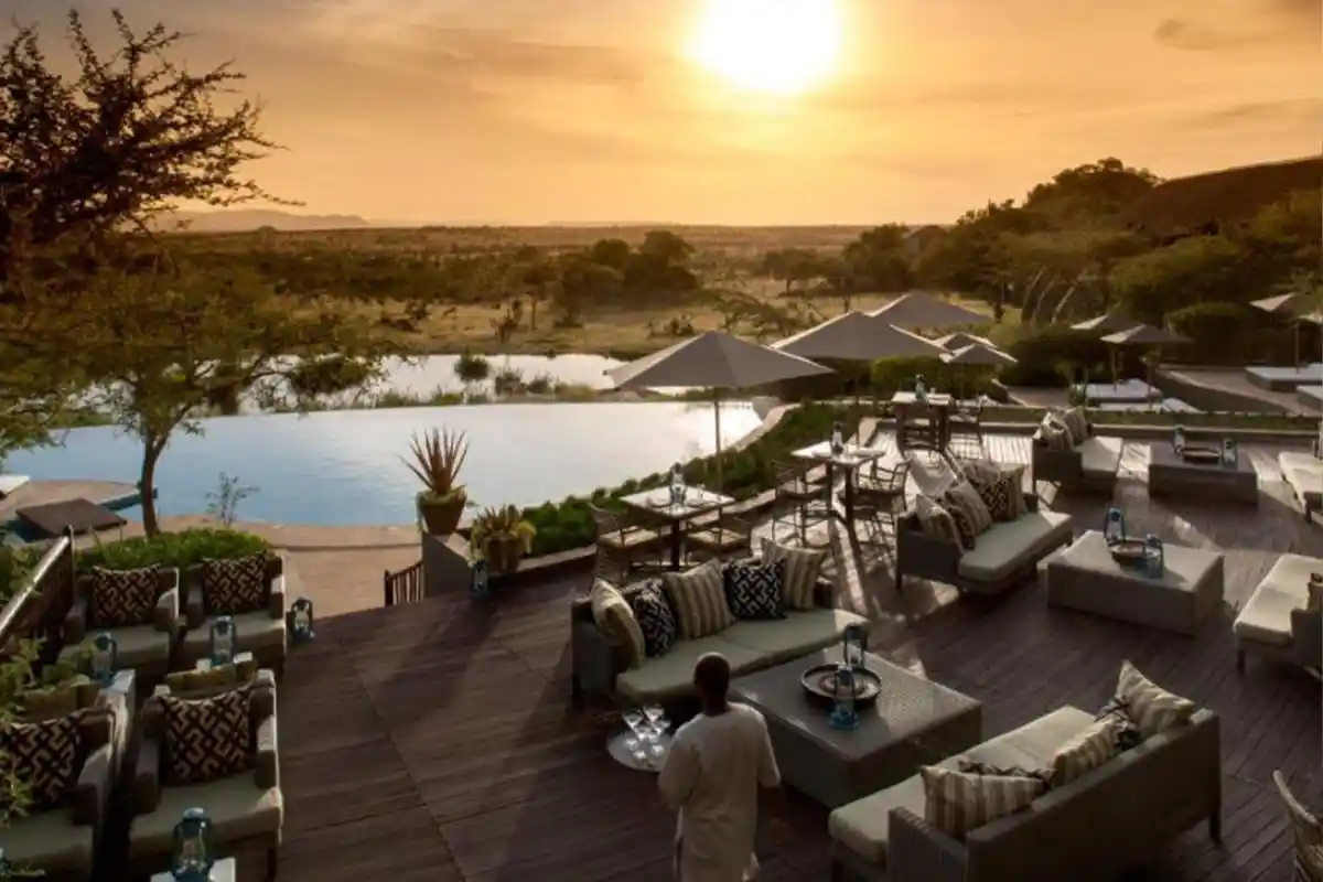 Four Seasons Safari Lodge Serengeti infinity pool with wildlife